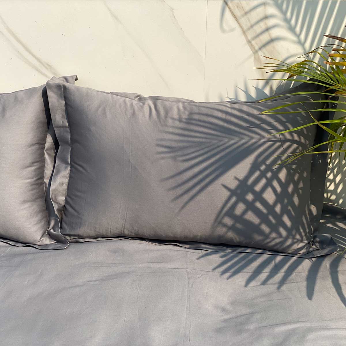 Close-up of dark grey cotton satin fabric texture