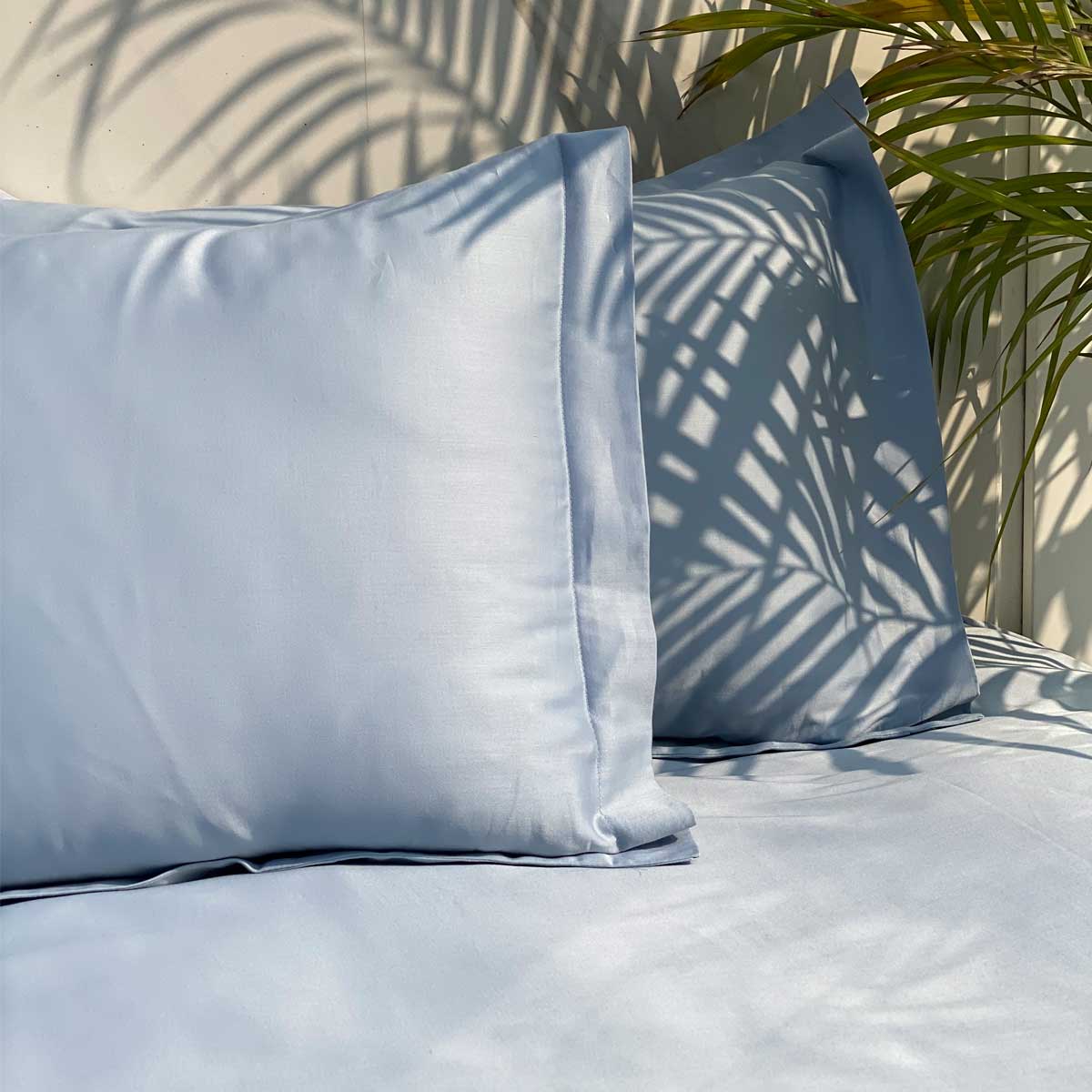 Close-up of smoke blue cotton satin fabric
